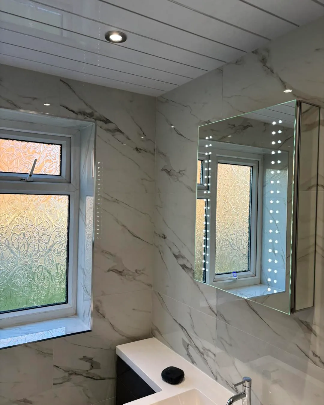 window and lighted mirror